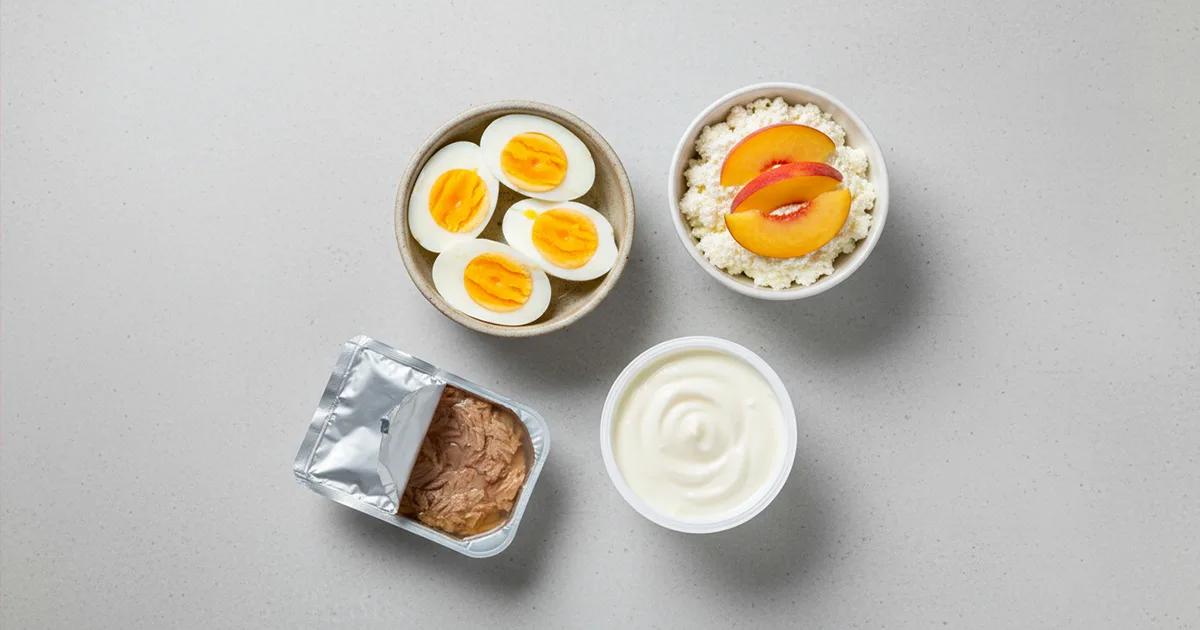 high protein low calorie snacks including hard boiled eggs cottage cheese and Greek yogurt